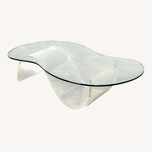 Used Vintage/Antique Transparent Coffee Table for sale on AptDeco