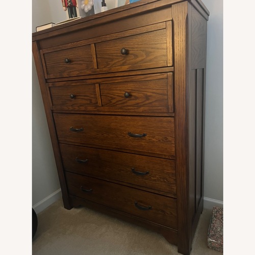 Used Ashley Furniture Chimerin Five Drawer Chest for sale on AptDeco