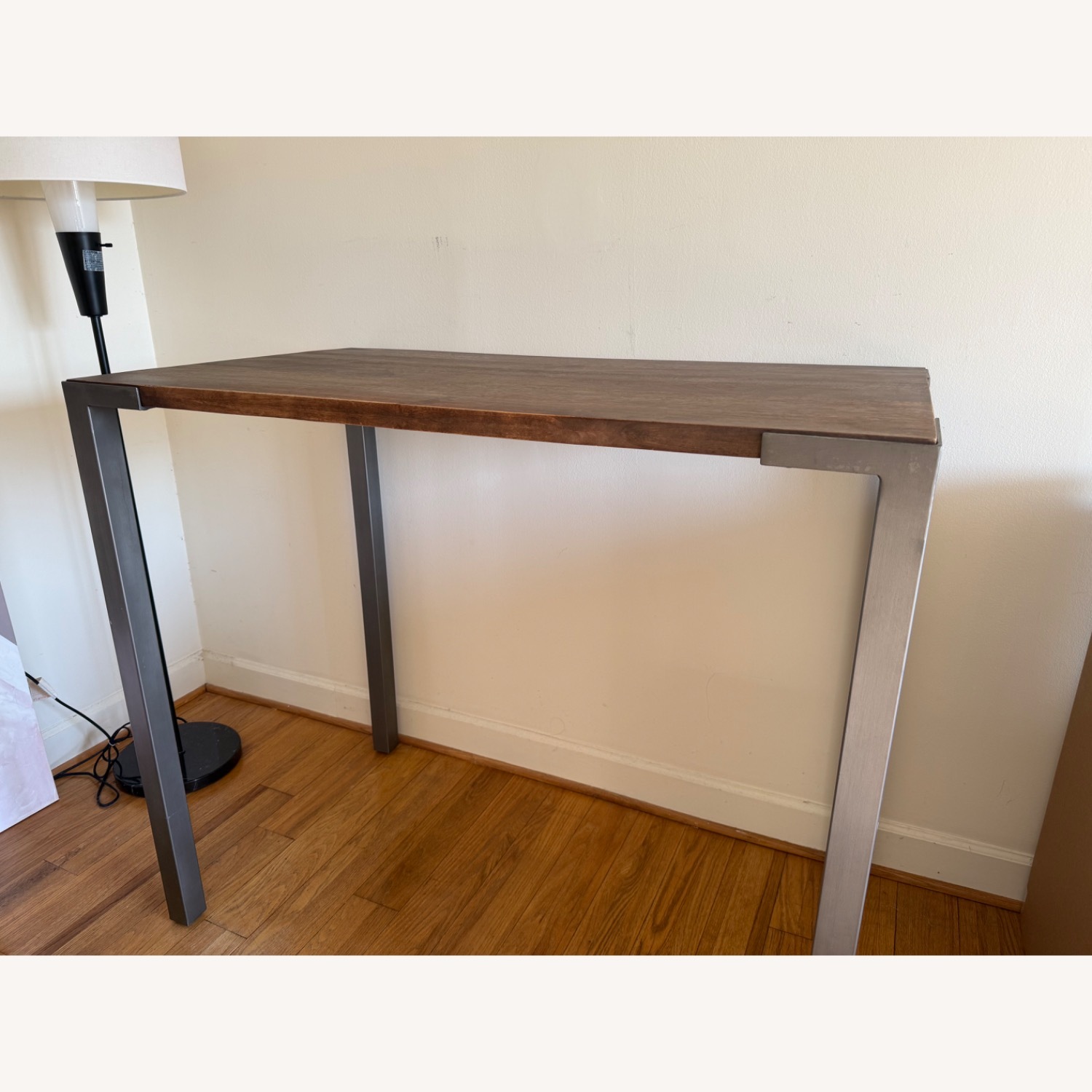 CB2 Stilt Dark Brown Wood Dining Table - image-1