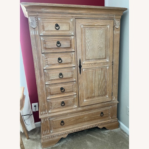 Used Rooms To Go Natural Wood Armoire for sale on AptDeco
