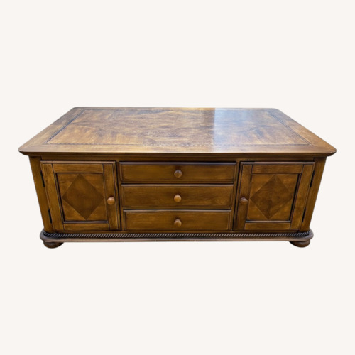 Used Huffman Koos Solid Wood Coffee Table  for sale on AptDeco