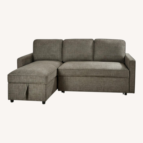 Used Ashley Furniture Kerle 2-Piece Sectional with Pop Up Bed for sale on AptDeco