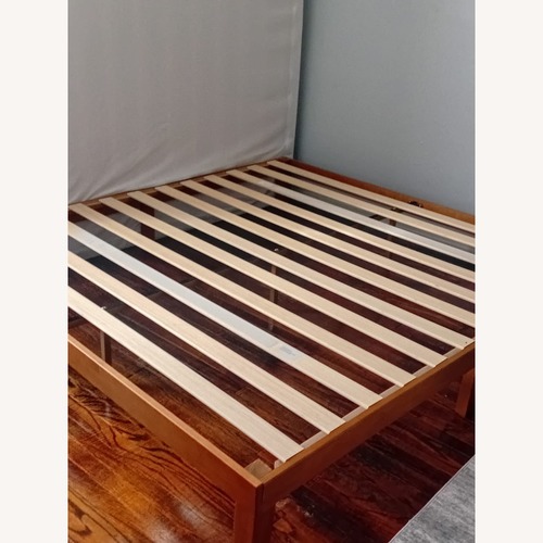 Used AllModern Amaryn Dark Brown Wood King Bed for sale on AptDeco