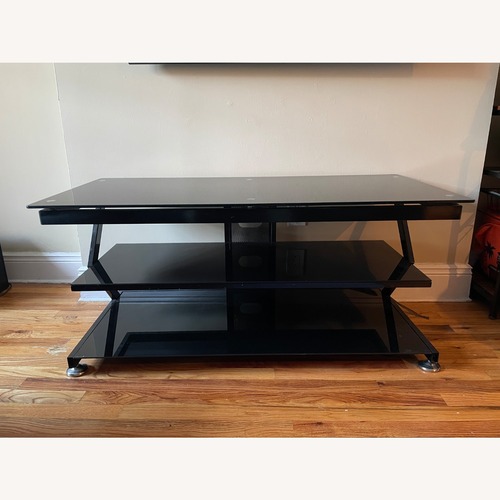 Used Black Glass 3-Tier TV Console for sale on AptDeco