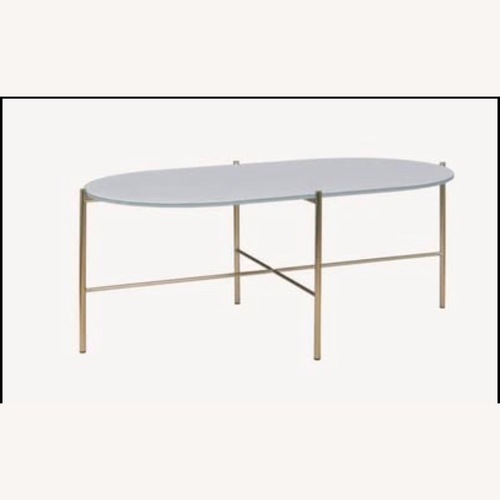 Used Article Light Grey Oblong Glass Coffee Table  for sale on AptDeco