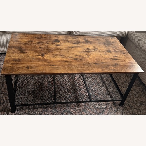 Used Amazon Dark Brown Wood Coffee Table for sale on AptDeco