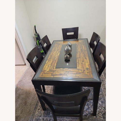 Used 6 Chail Glass Top Dining Table for sale on AptDeco