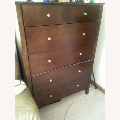 Used Dark Brown Wood Armoire for sale on AptDeco