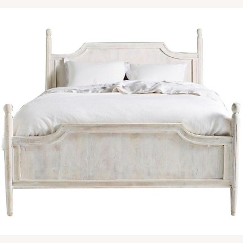 Used Anthropologie Washed Natural Wood Queen Bed for sale on AptDeco
