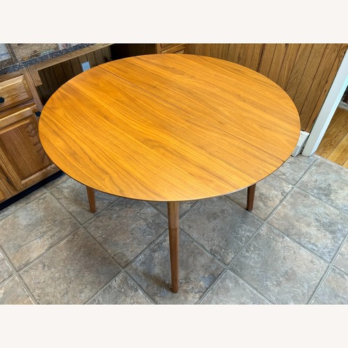 Used West Elm Rounded Extendable Dining Table  for sale on AptDeco