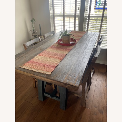 Used Dark Wood Dining Table for sale on AptDeco