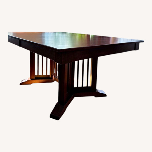 Used Light Brown Wood Dining Table for sale on AptDeco