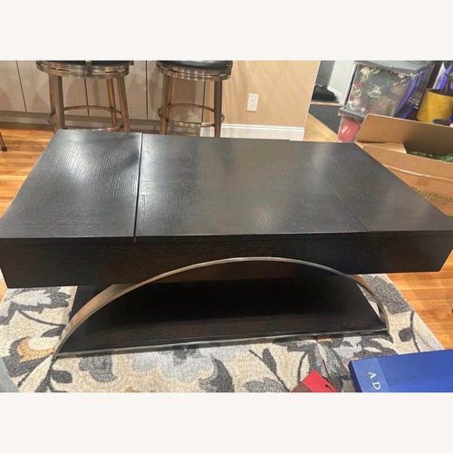 Used Raymour & Flanigan Sloane Rectangular Lift-Top Cocktail Table for sale on AptDeco