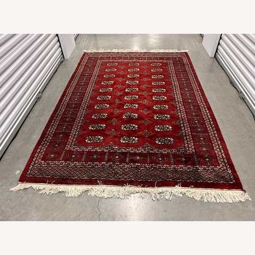 Used Pakistani Bukhara Handknotted 100% Wool Area Rug for sale on AptDeco