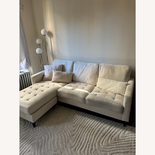Used Raymour & Flanigan White-Cream Sofa for sale on AptDeco