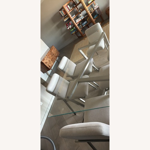 Used Daphne Glass Dining Table + 6 Chairs for sale on AptDeco