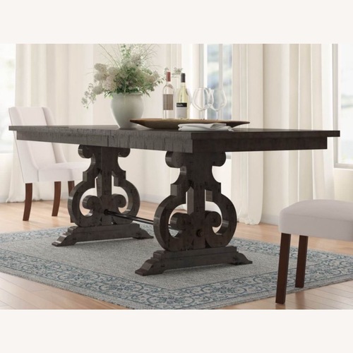 Used Birch Lane Dark Brown Wood Dining Table for sale on AptDeco