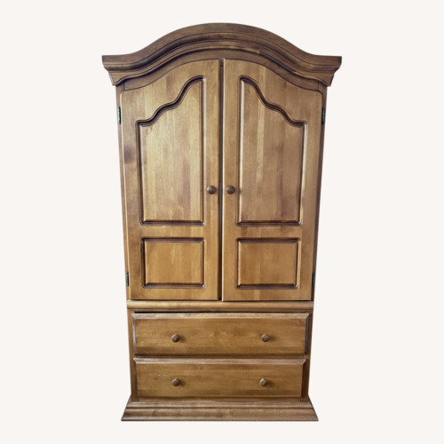 Used Bellini Furniture Light Brown Wood Armoire for sale on AptDeco