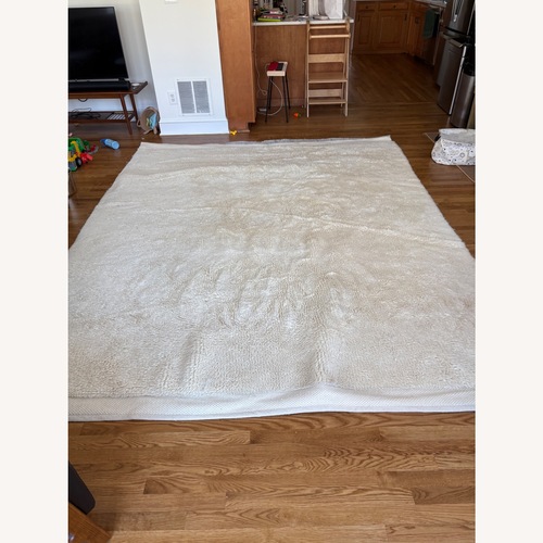 Used West Elm Handloom White Wool Area Rug 8' x 10' for sale on AptDeco