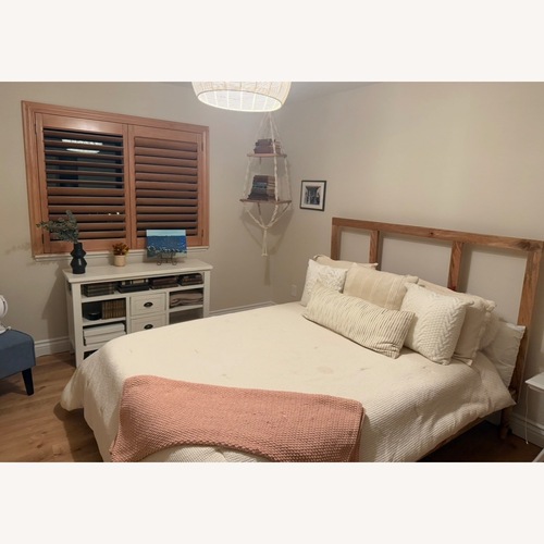 Used Urban Outfitters Custom Natural Wood Queen Bed for sale on AptDeco