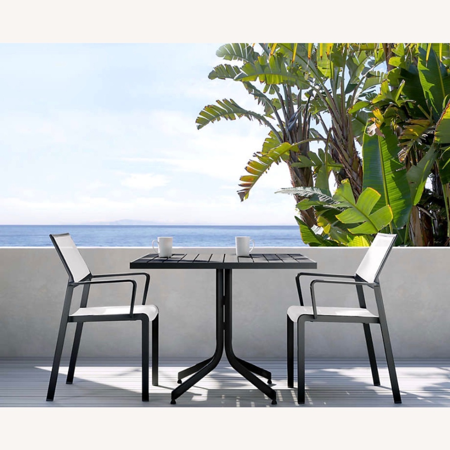 Crate & Barrel Black Metal Patio Furniture - image-1