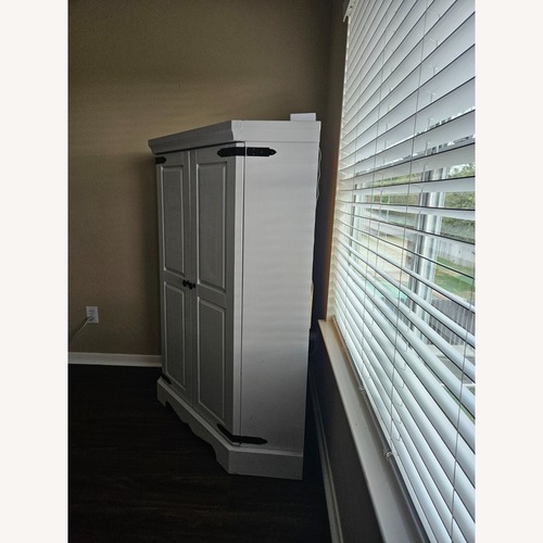 Used Corner Armoir Unit Light Gray Wood Armoire for sale on AptDeco