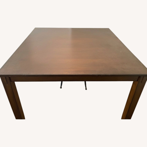 Used Ashley Furniture Dark Brown Wood Dining Table for sale on AptDeco