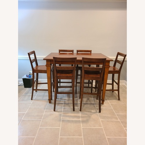 Used Dark Brown Wood Play Table for sale on AptDeco