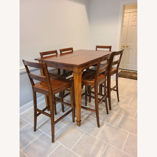 Used Dark Brown Wood Play Table for sale on AptDeco