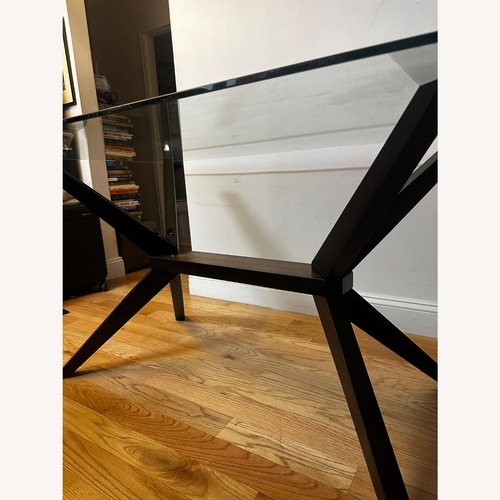 Used Dark Brown Glass Dining Table for sale on AptDeco