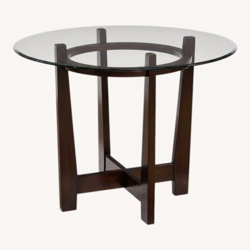 Used Round Glass Dining Table for sale on AptDeco