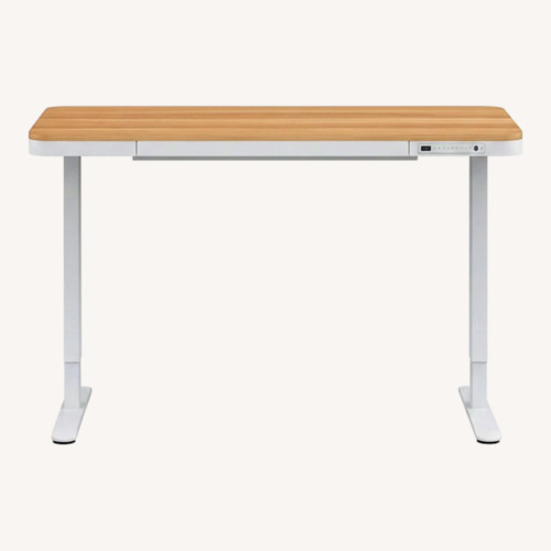 Used Flexispot Standing Desk with Bamboo Surface for sale on AptDeco