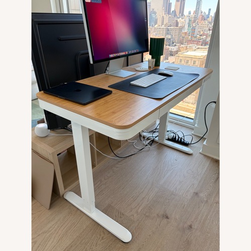 Used Flexispot Standing Desk with Bamboo Surface for sale on AptDeco