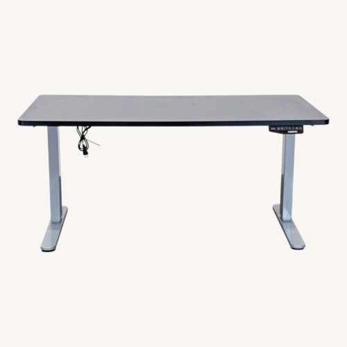 Used FlexiSpot Electric Height Adjustable Standing Desk for sale on AptDeco