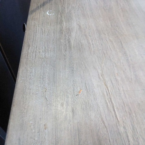 Used World Market Gray Wooden Desk with Sawhorse Legs for sale on AptDeco