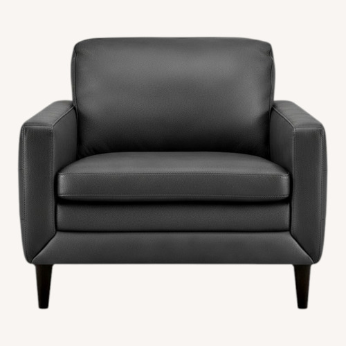 Used Macy's Locasta Gray Leather Armchair With Ottoman for sale on AptDeco