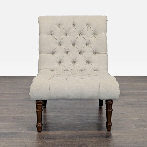 Used Beige Tufted Armless Lounge Chair with Wooden Legs for sale on AptDeco
