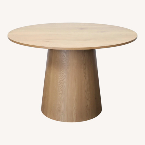 Used Cone Base Wood Dining Table for sale on AptDeco