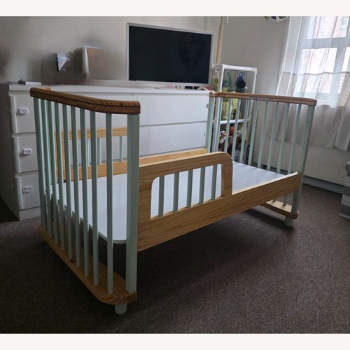 Used Candy Cloud Green Wood Toddler Bed for sale on AptDeco