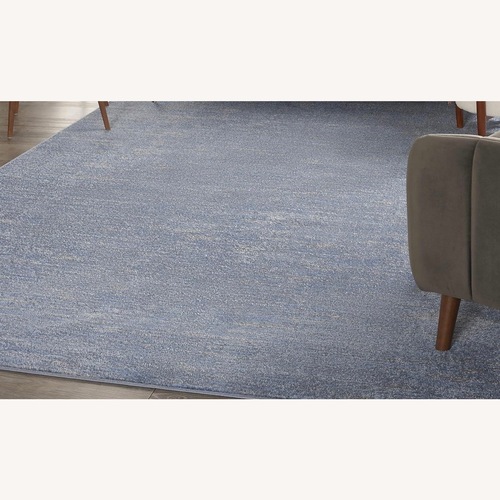 Used Nourison Blue Area Rug 8' x 10' for sale on AptDeco