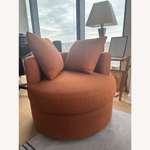 Used Debbie Burnt Orange Upholstered Swivel Chair for sale on AptDeco