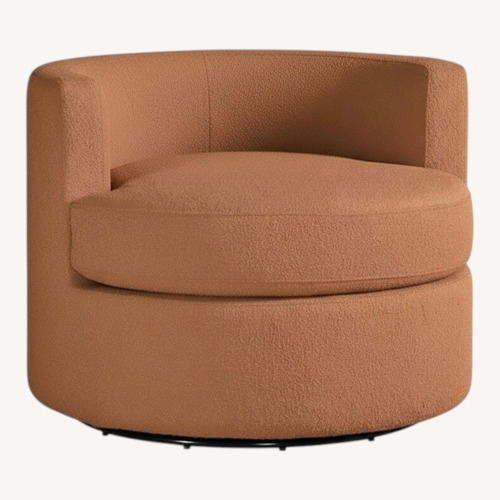 Used Debbie Burnt Orange Upholstered Swivel Chair for sale on AptDeco