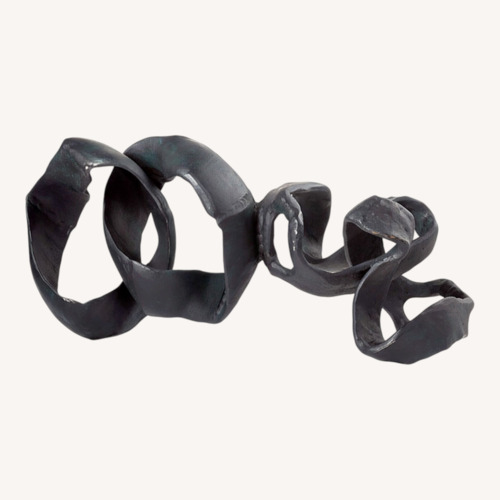 Used CB2 Black Aluminum Ribbon Table Sculpture for sale on AptDeco