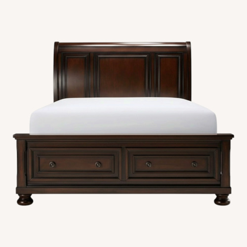 Used Raymour & Flanigan Brown Wood Queen Bed Frame for sale on AptDeco
