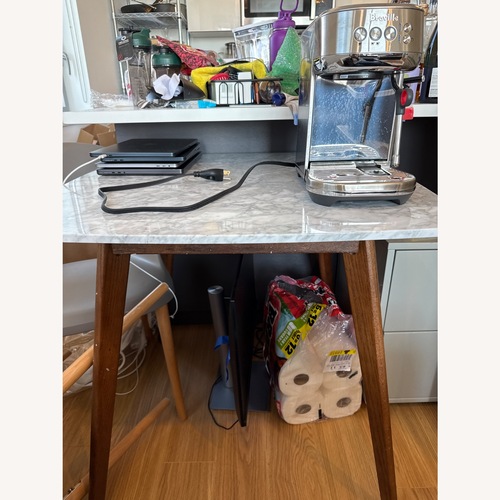 Used Article Vena Cafe Table Dining Table for sale on AptDeco