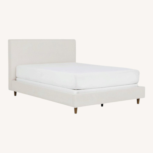 Used Living Spaces Upholstered Queen Bedframe for sale on AptDeco