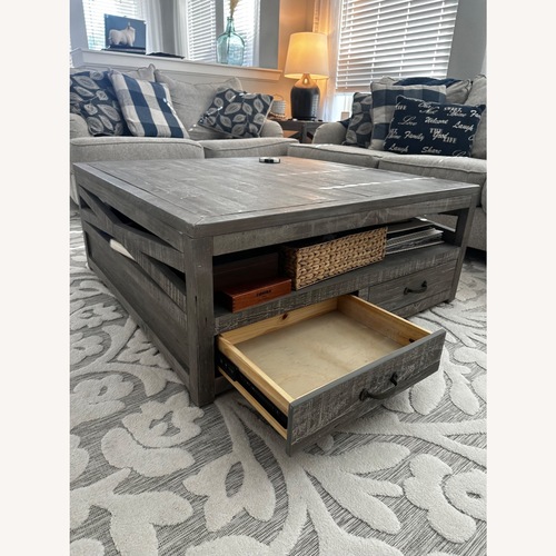 Used Rooms To Go Savenay Gray Cocktail Table for sale on AptDeco