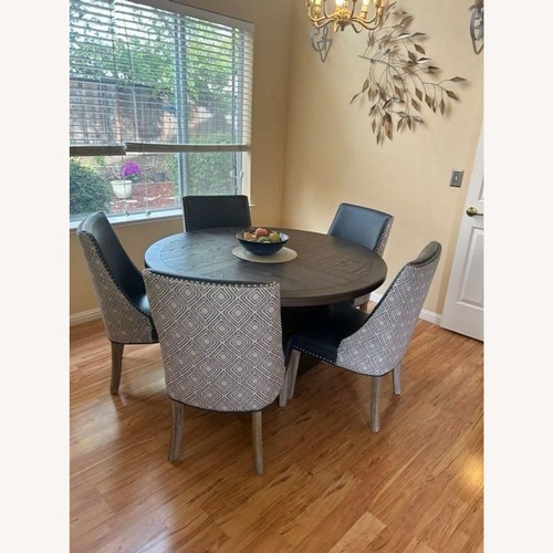 Used Home Meridian Helms Round Dining Table for sale on AptDeco