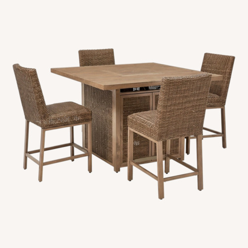 Used Outdoor Bar Table and Stools for sale on AptDeco