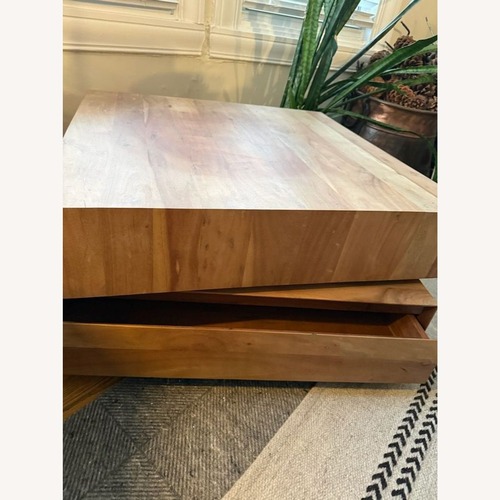 Used CB2 Spin Rotating Coffee Table with Two Drawers for sale on AptDeco